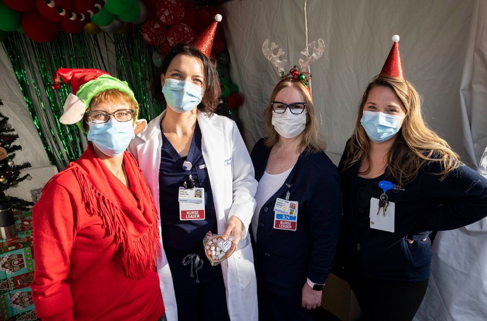 Senior leaders, managers, and employees handed out hot chocolate kits, candy canes, s’mores cookies, and pretzels during Winter Wonderland, a two-day celebration in December 2021 to show gratitude to staff and physicians.